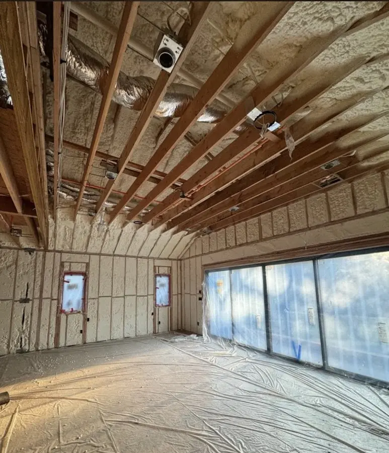 Interior walls and ceiling insulated with spray foam during new construction in Lansdowne